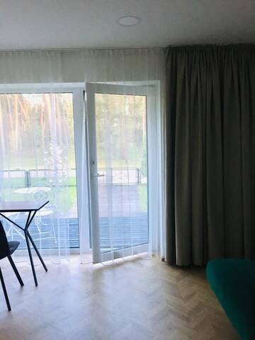 Фото номера Люкс с террасой Проживание в семье Park Apartments г. Kulautuva 8